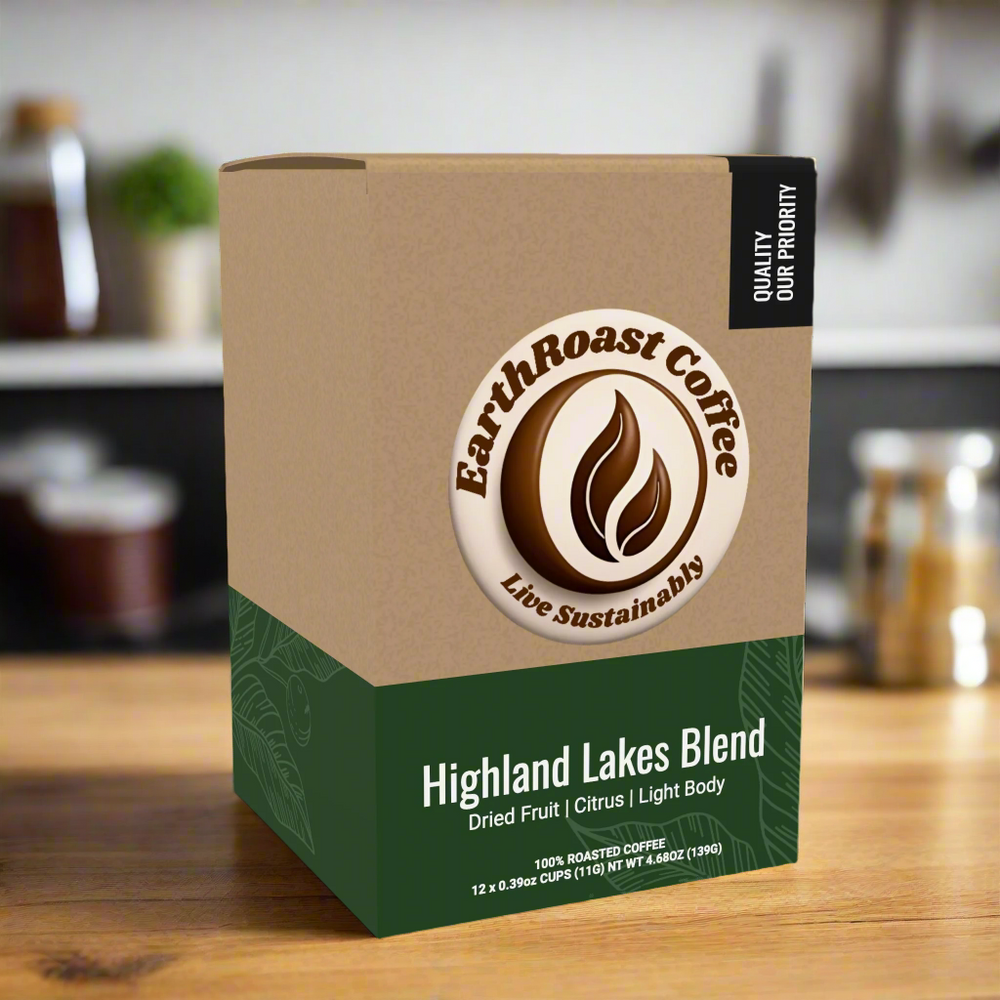 Front view of EarthRoast Coffee's Highland Lakes Blend Coffee Pods box, featuring a natural kraft design with the EarthRoast Coffee logo. This specialty coffee offers flavors of dried fruit and citrus with a light body, emphasizing its organic and sustainably sourced quality.