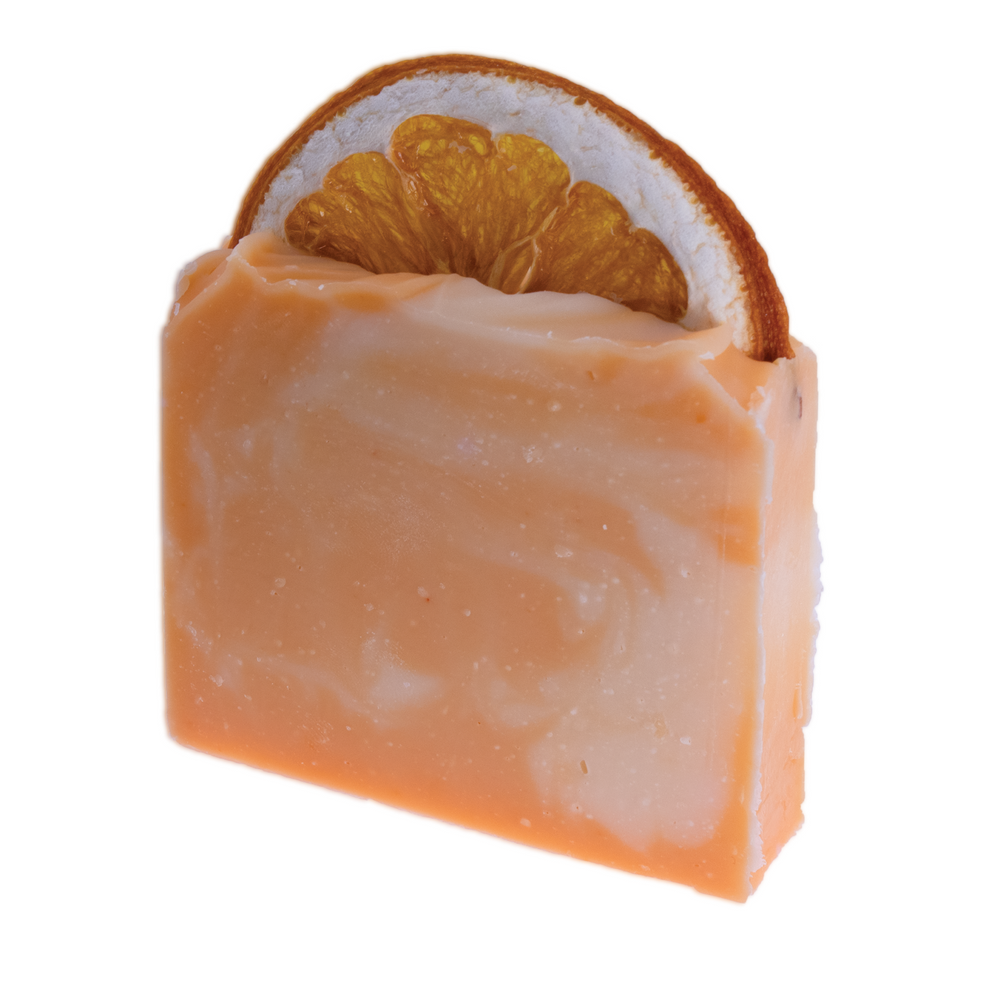 Handcrafted Orange & Bergamot Soap with citrus slice, nourishing and invigorating.